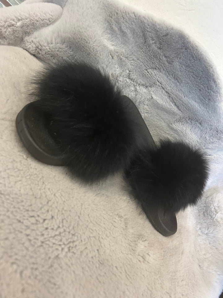 Black fur sliders with black sole 