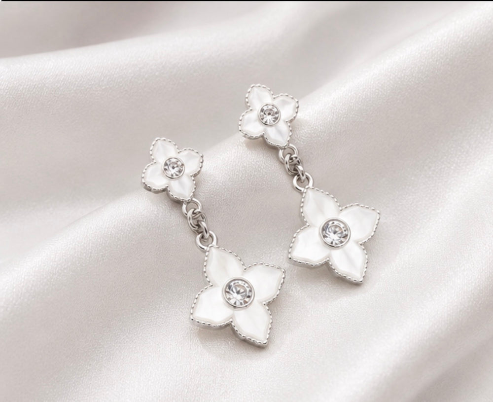 White stainless steel clover drop earrings with crystal centres