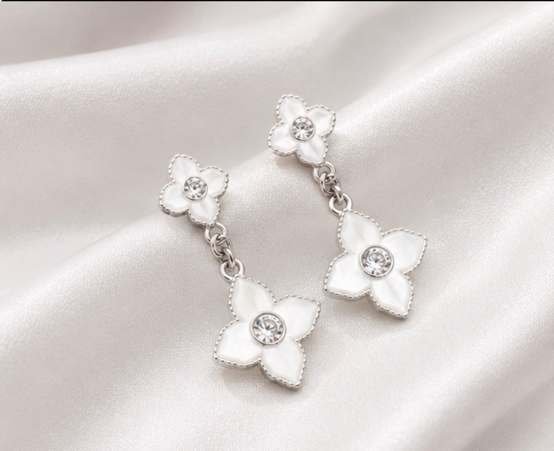 White stainless steel clover drop earrings with crystal centres