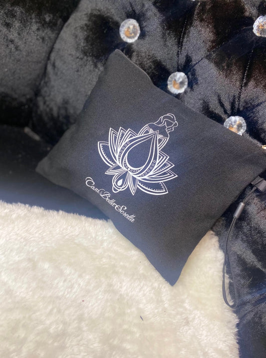 A black canvas mini insert bag with a white floral design and text