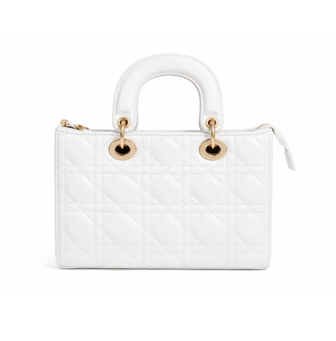 A white quilted leather top-handle handbag with gold-tone hardware, shown against a plain white background.