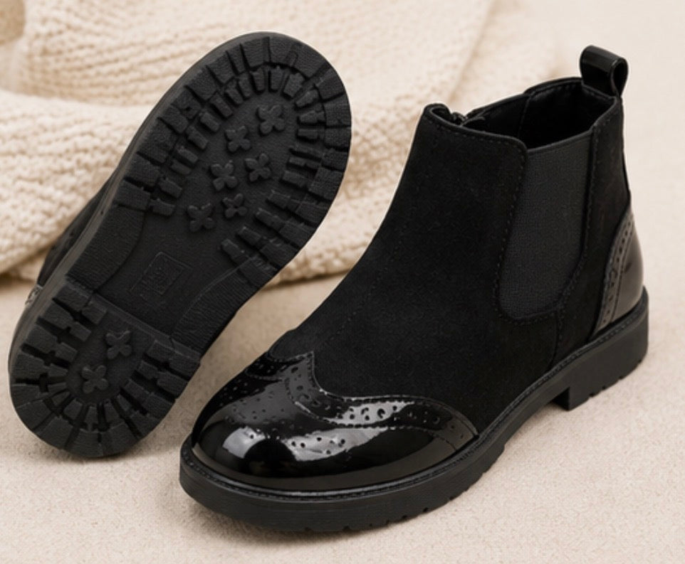 Black kids ankle boots with glossy patent toe cap and heel detail