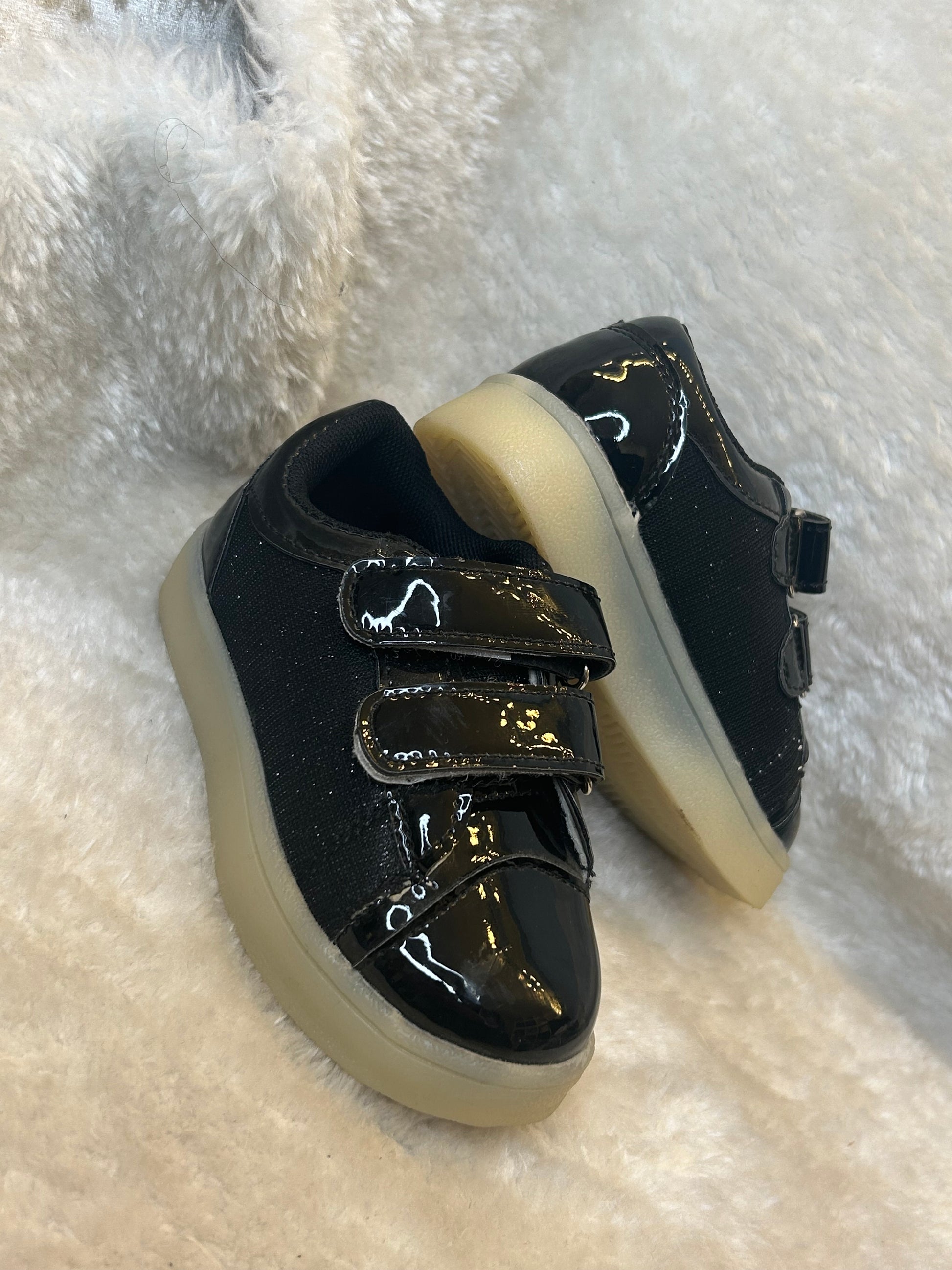 Children’s black patent and fabric trainers with double velcro straps and chunky light sole