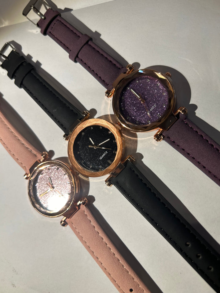 Glitter-faced watches with rose gold hardware and adjustable straps 