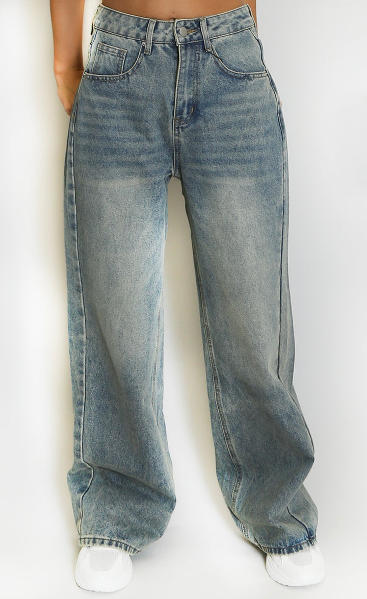 Blue slouchy jeans worn by a person