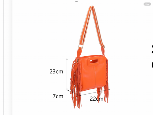 Orange handbag with fringe details and measurements 