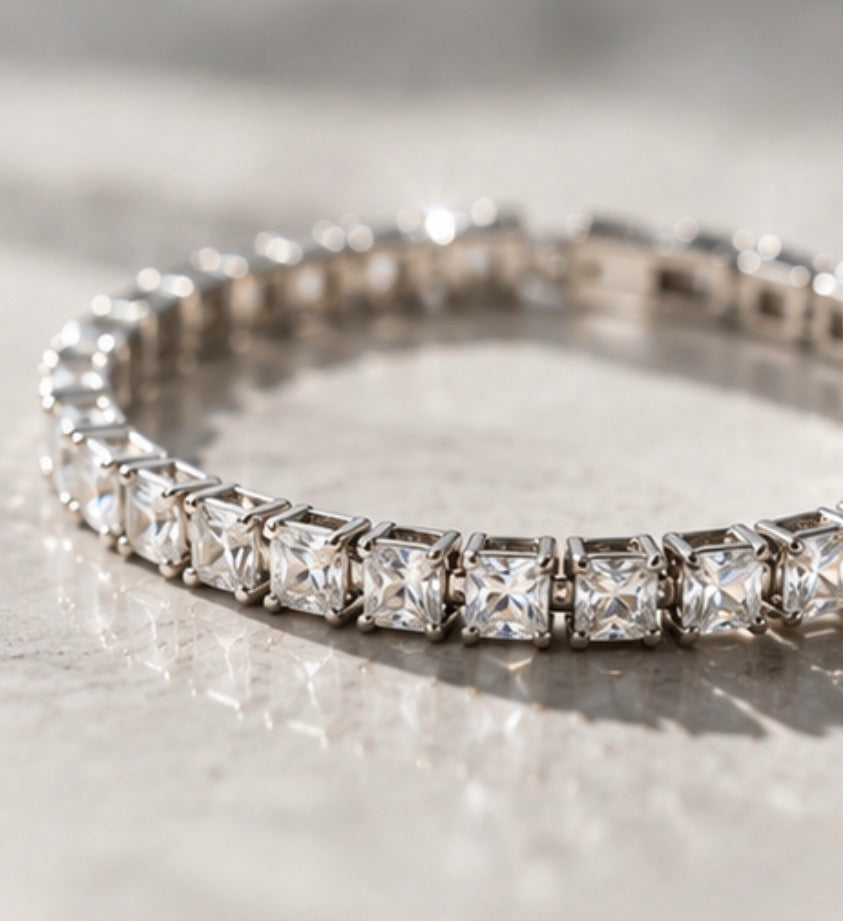 Silver tennis bracelet featuring sparkling square-cut cubic zirconia stones