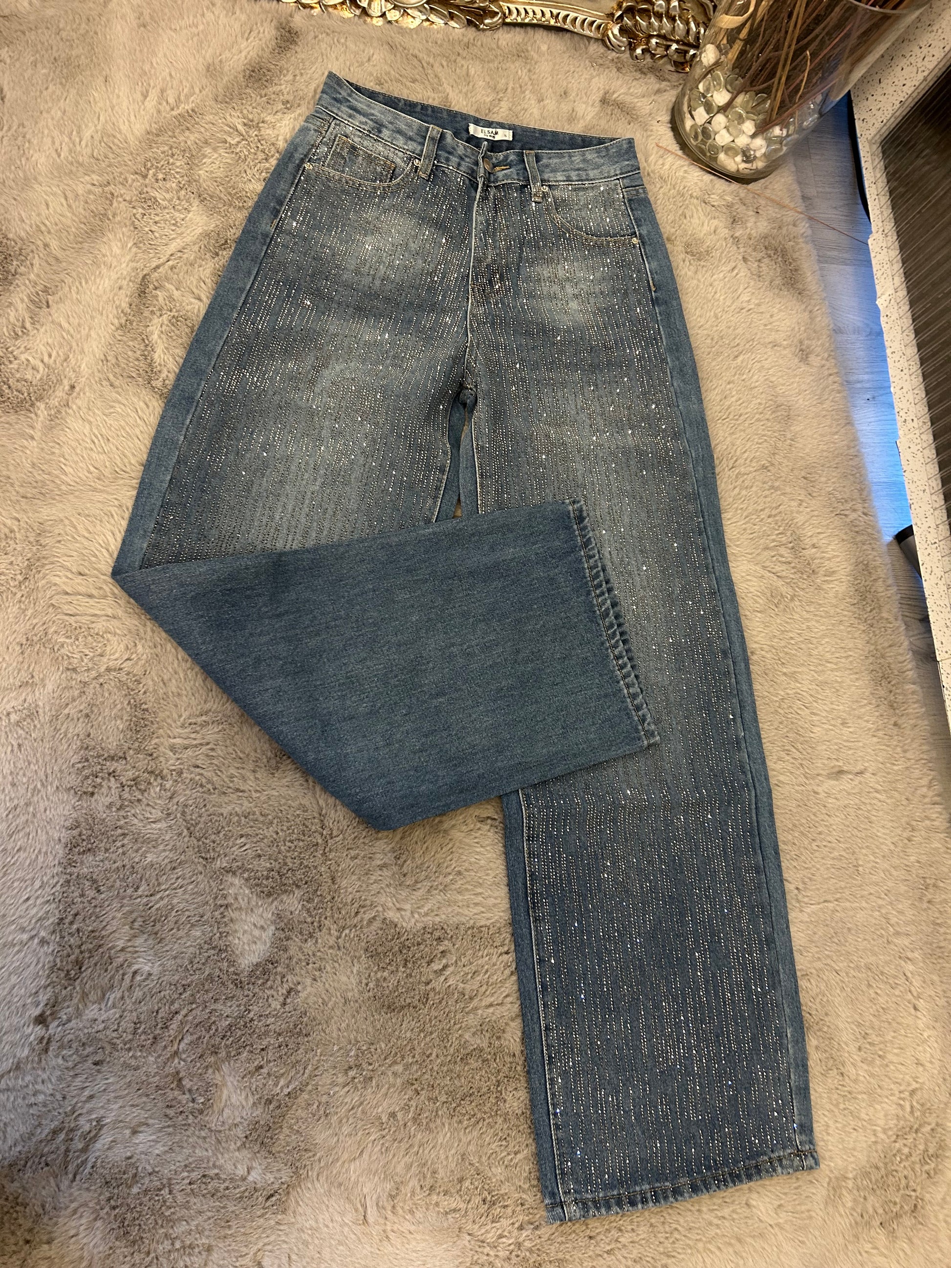 Embellished crystal on blue jeans