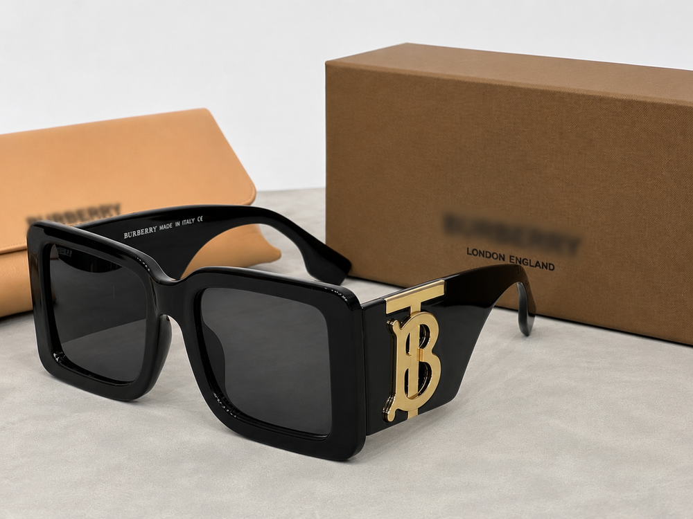Black chunky sunglasses with gold detail 