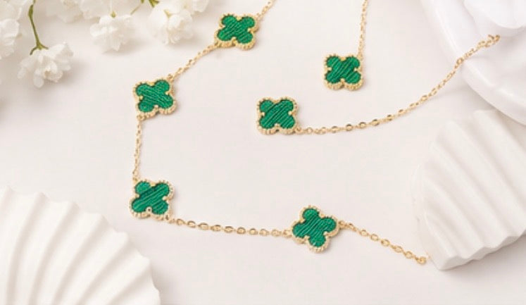 Gold-tone green clover necklace and matching stud earring set 