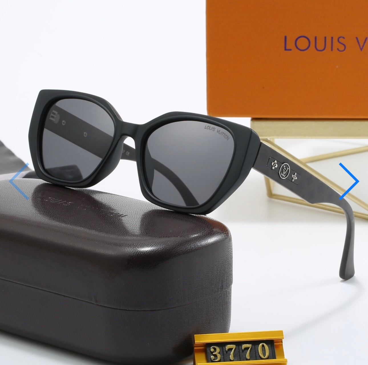 Black sunglasses with gold detailing 