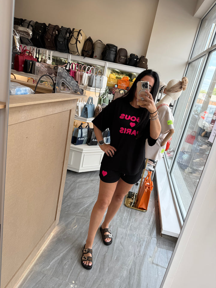Shorts and T-shirt set in black with pink writing text 