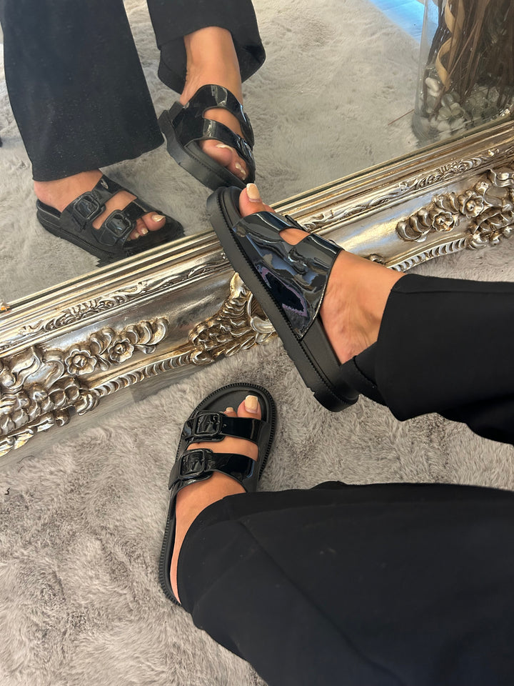 Black patent sandal with buckle design
