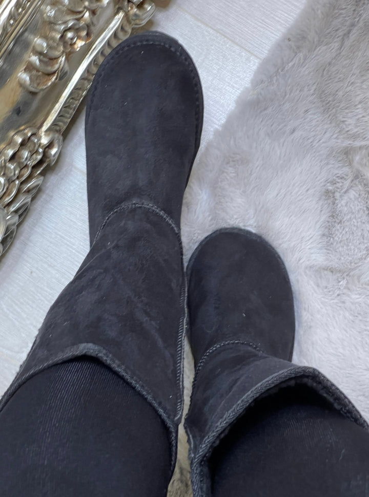 Black faux fur lined winter boots tall and mid calf
