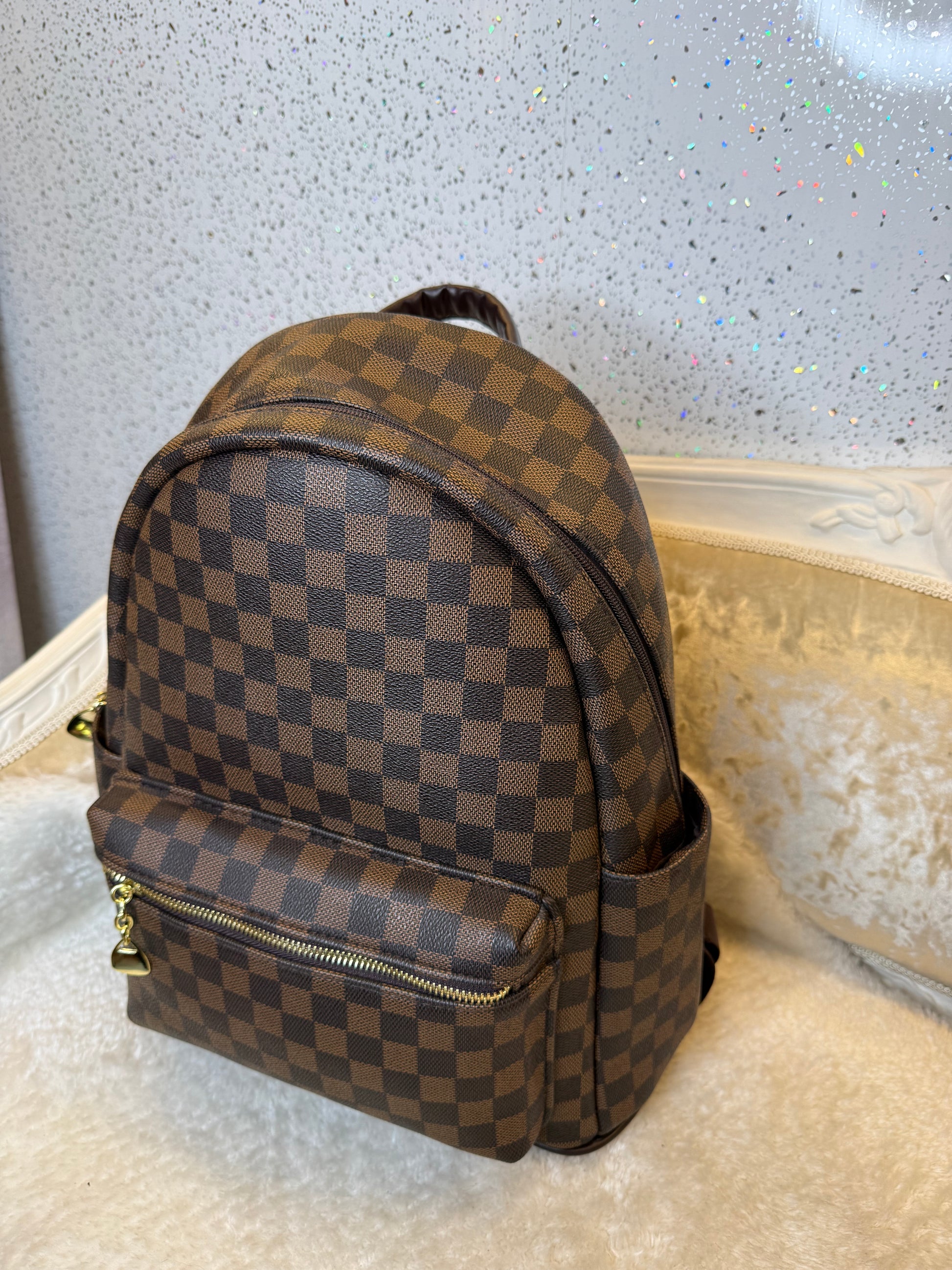 Brown checked rucksack backpack with gold detailing 