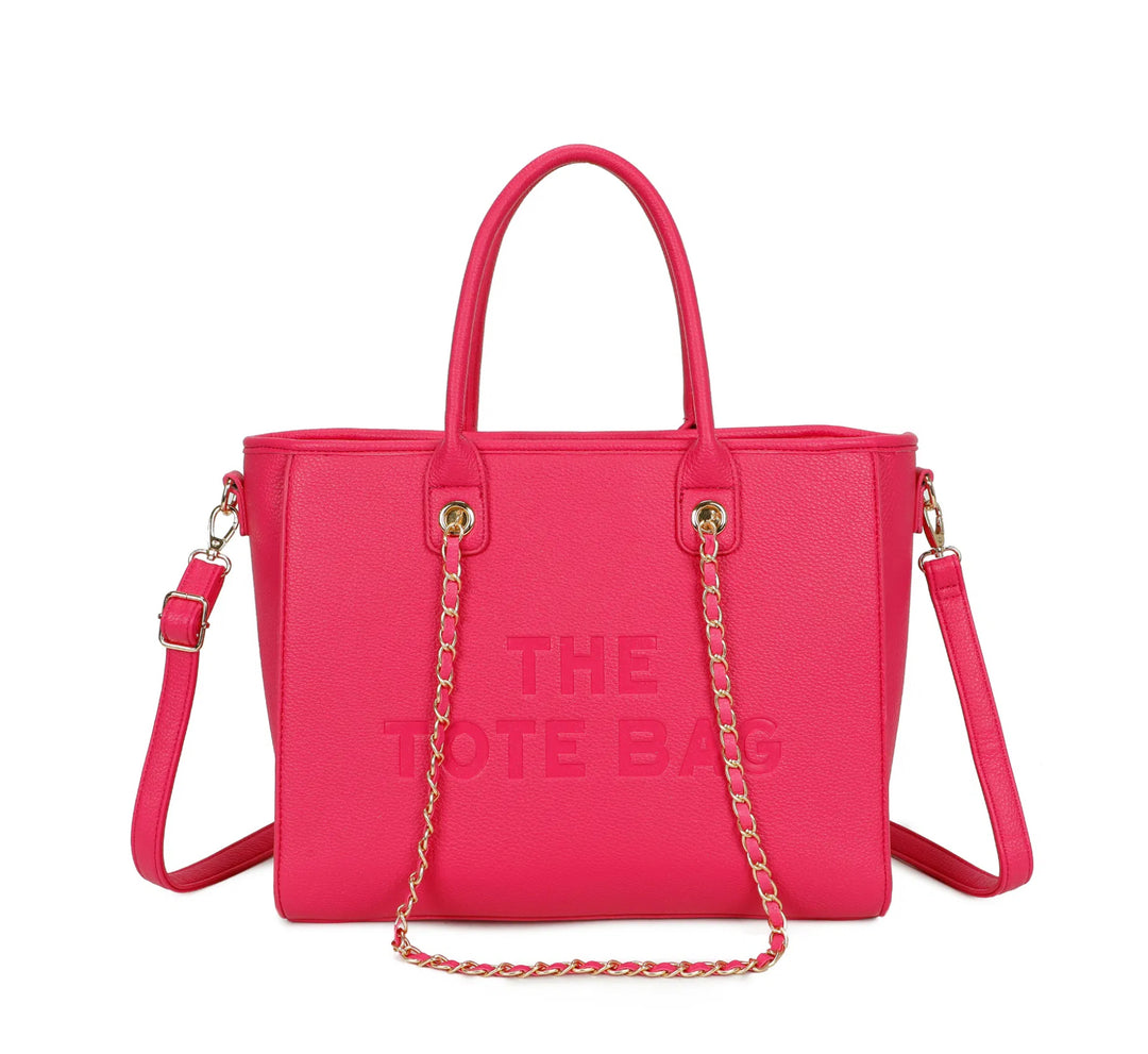 Hot pink tote bag with chain strap detail 