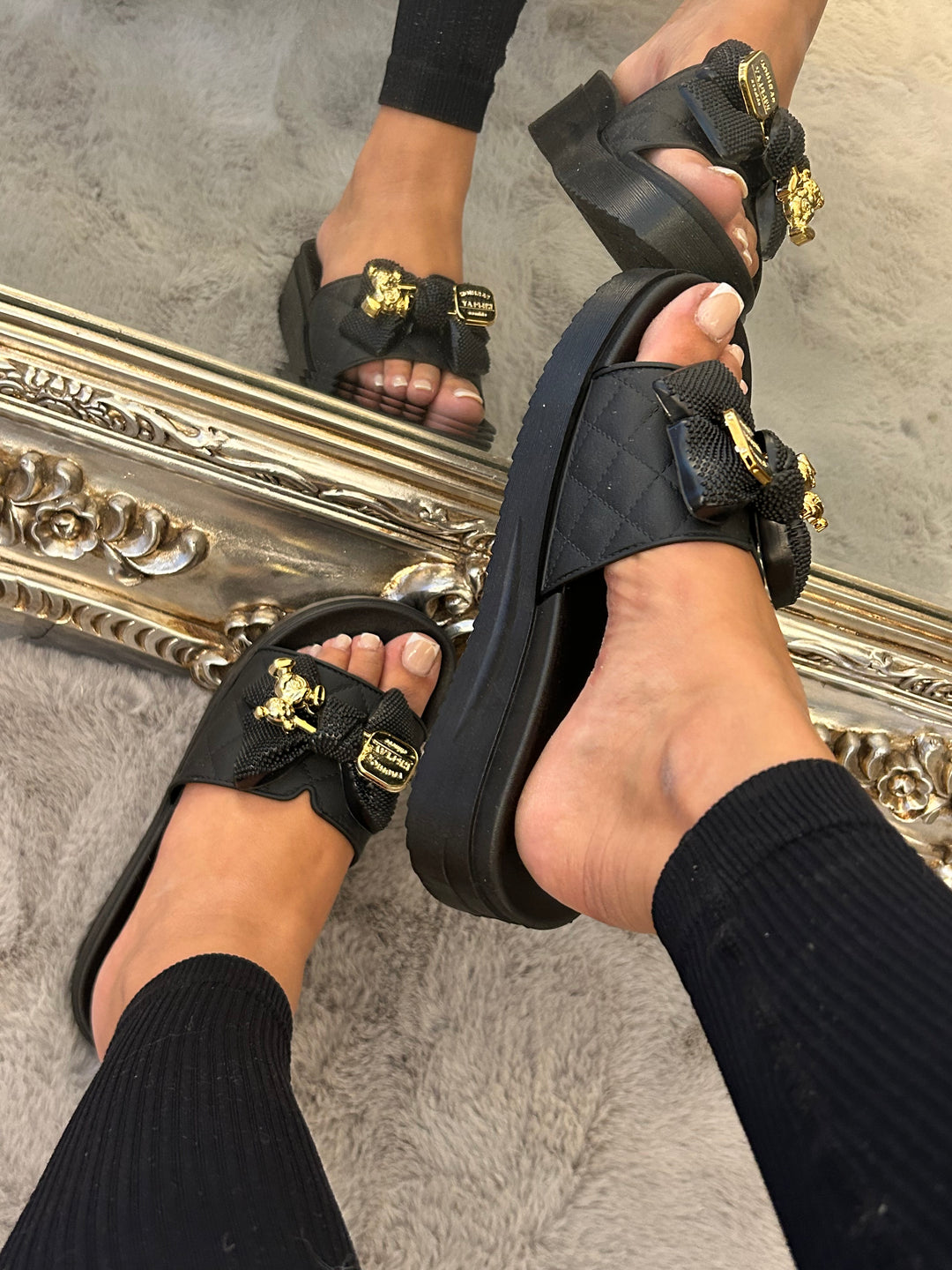 Gold and bow black detailed platform sliders 