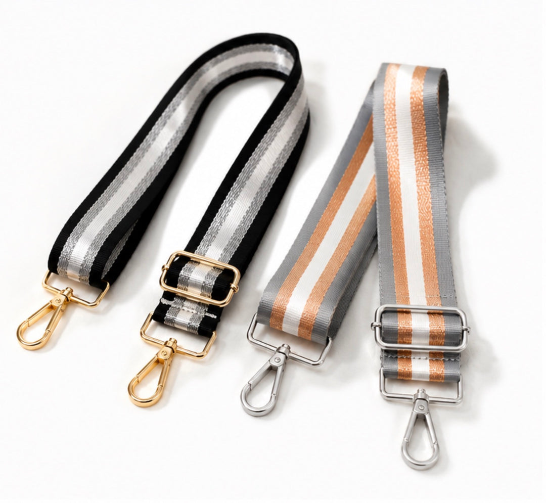 Adjustable striped handbag strap with premium metal hardware for shoulder and crossbody bags.