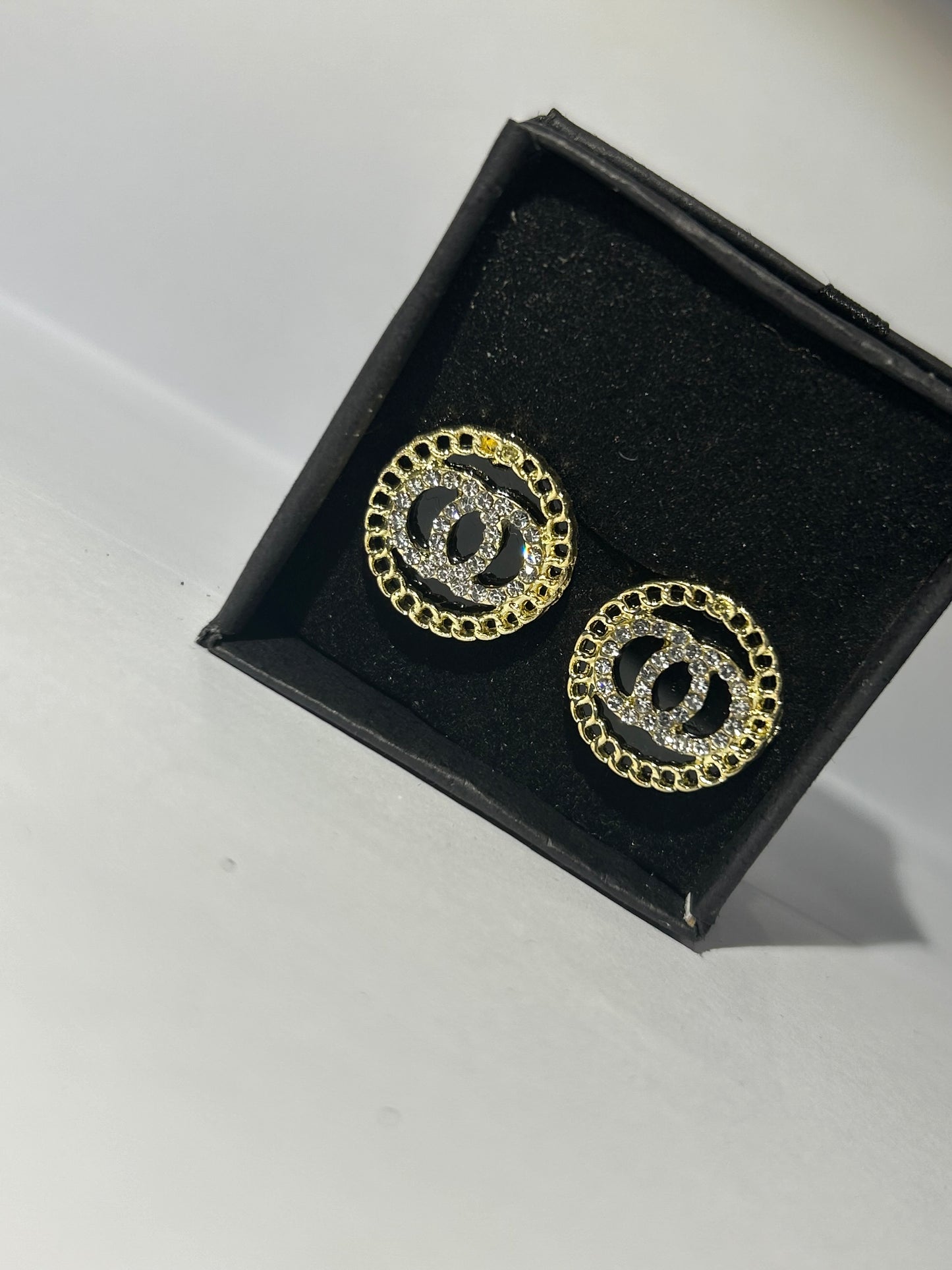 Black and gold circle earrings