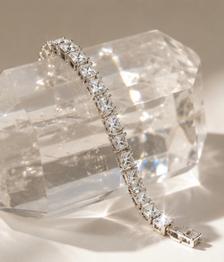 Silver tennis bracelet featuring sparkling square-cut cubic zirconia stones
