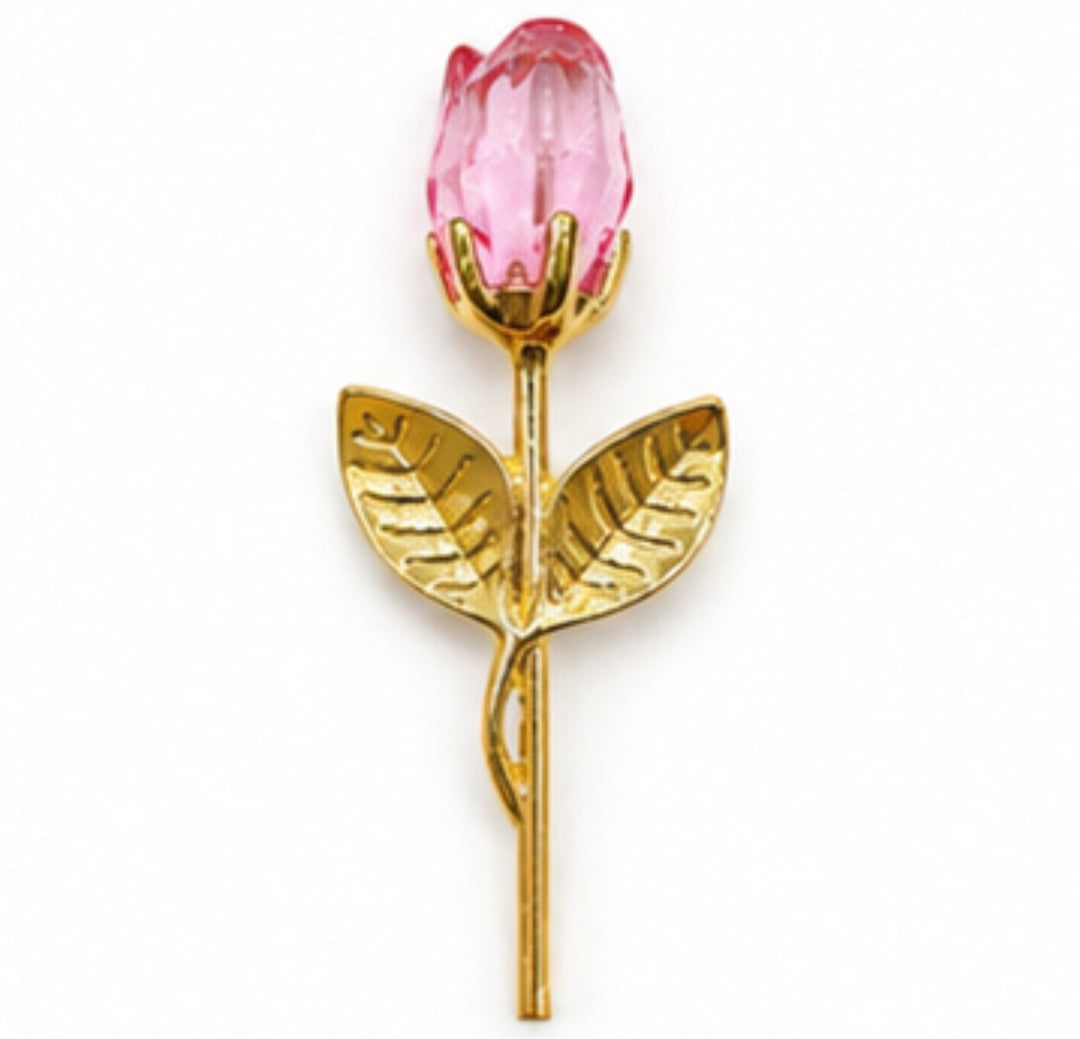 Pink crystal rose keepsake with gold-tone stem and leaves presented in satin-lined gift box
