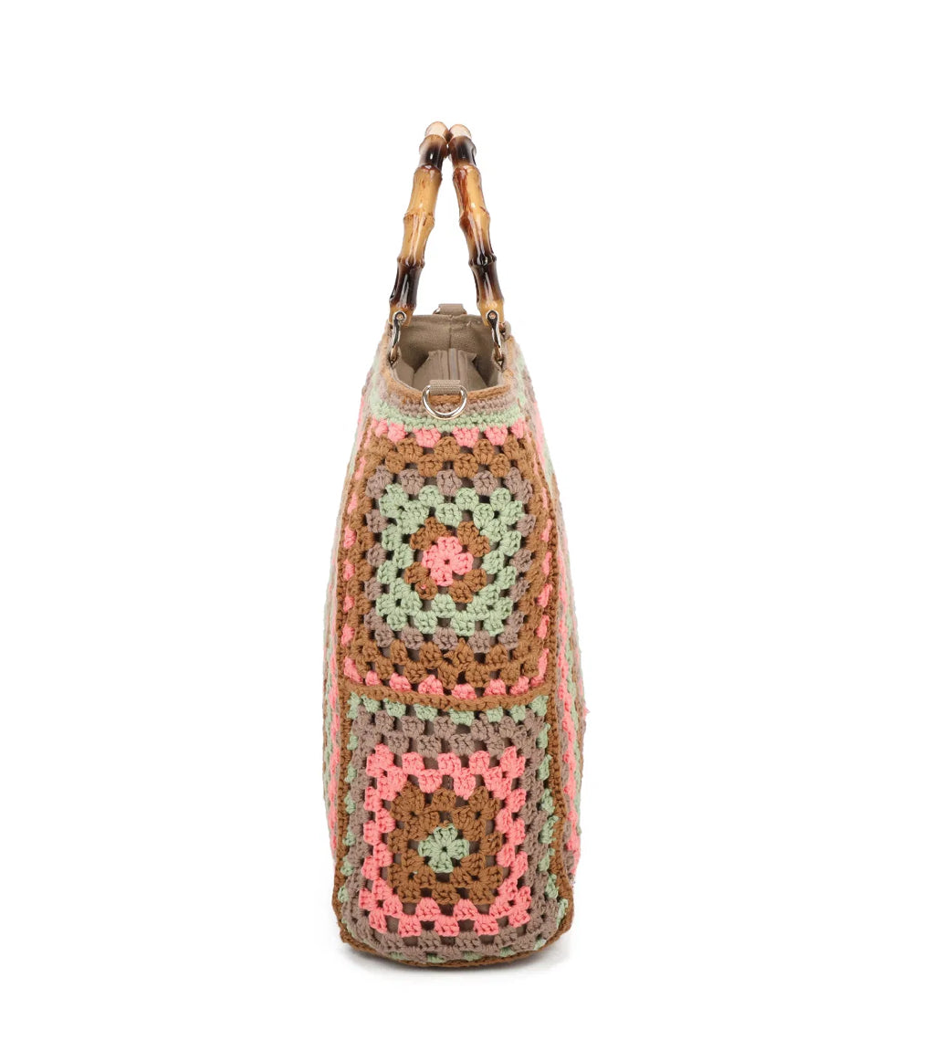 crochet grab bags with bamboo handles and a top zip closure