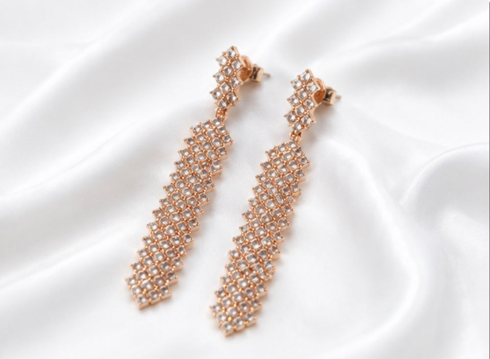     Long statement earrings with crystal detailing