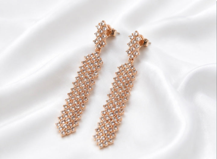     Long statement earrings with crystal detailing