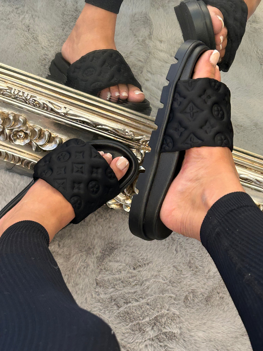     Women’s black slip-on sliders with cushioned sole
