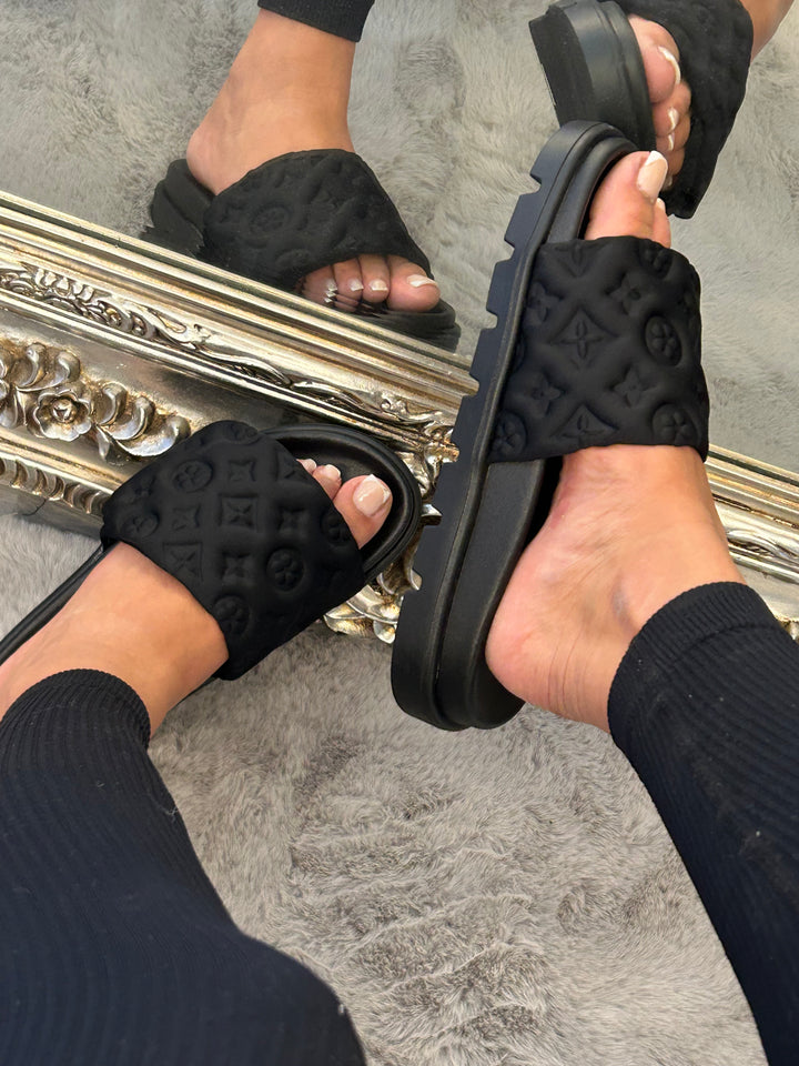     Women’s black slip-on sliders with cushioned sole