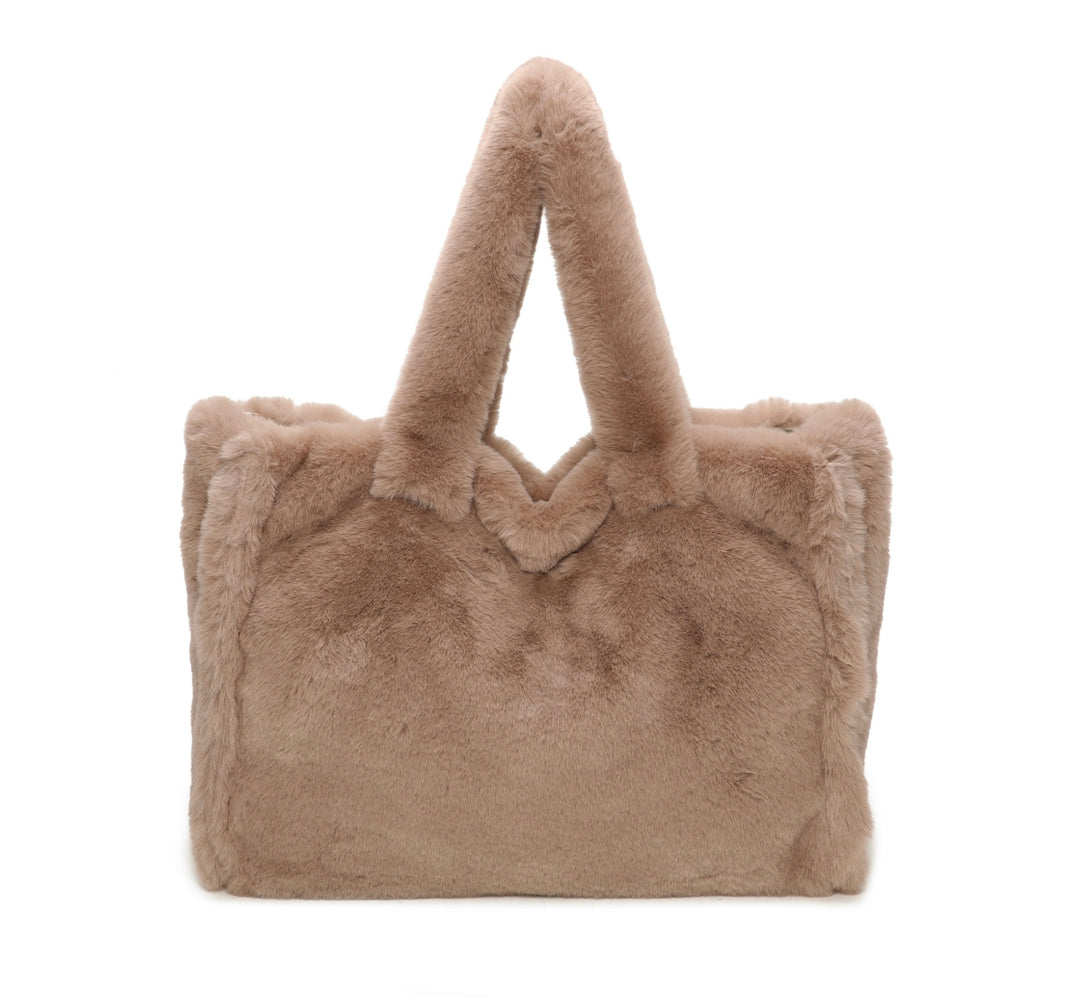 Beige faux fur tote bag with top handles and matching shoulder strap