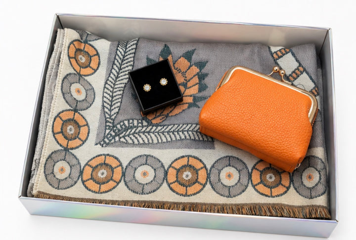 Luxury gift bundle collection featuring four coordinated sets with soft patterned scarves, matching purses, wallets and elegant earrings, beautifully presented in gift boxes.