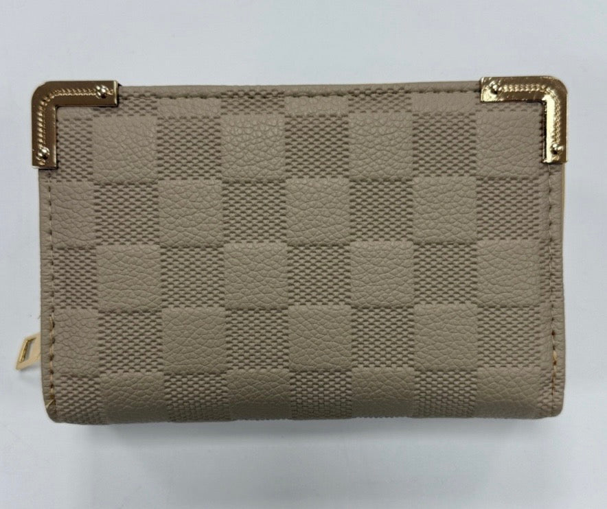 A beige quilted checked purse with gold-coloured edges and a zipper closure.
