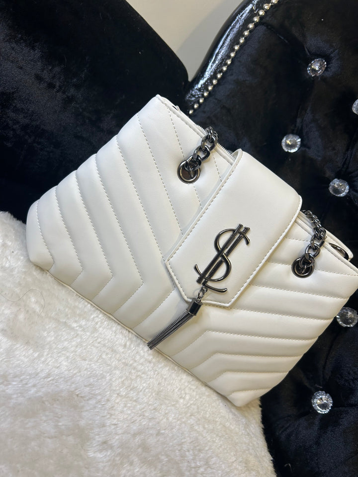White quilted medium size handbag with metal hardware, chain straps and flap closure