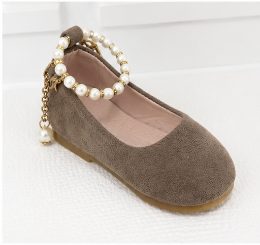 Girls taupe ballet flat shoes with pearl ankle bracelet strap, gold charm detail and soft suede-effect finish.