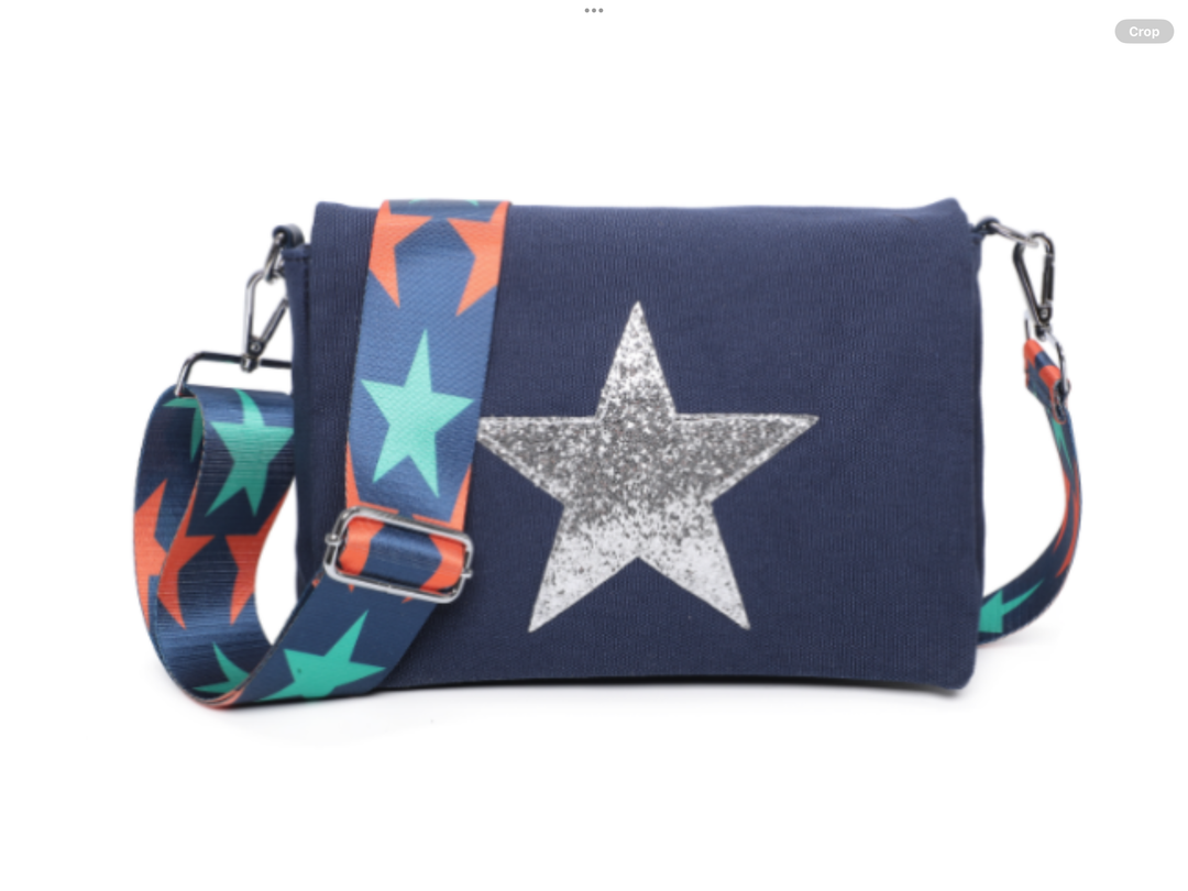 Navy blue handbag with a star design strap 