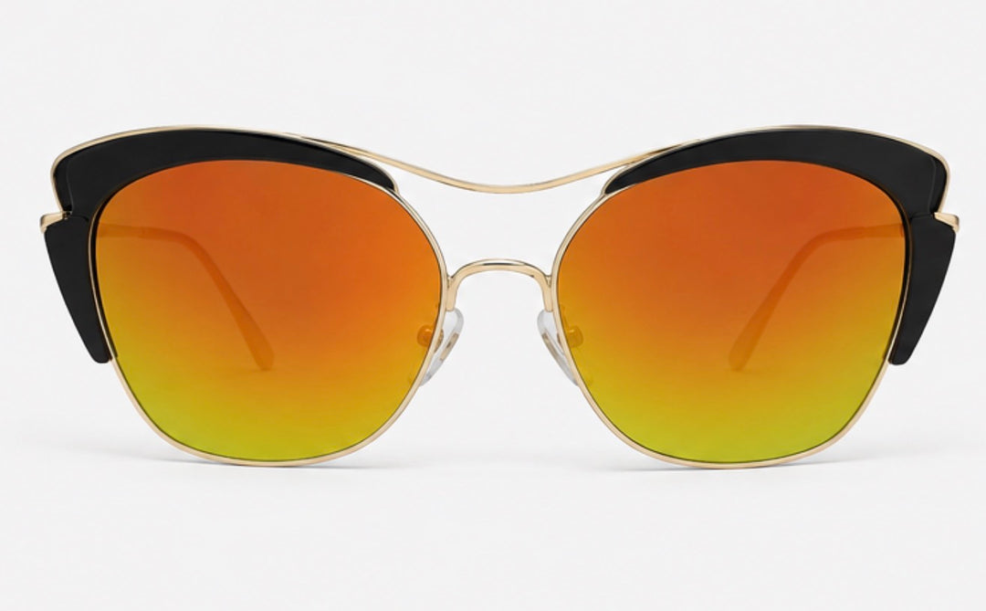 Black and gold cat-eye sunglasses with mirrored orange and green tinted lenses and slim gold arms 