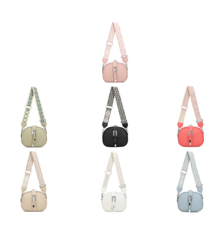 Crossbody bag with patterned strap and multiple zip compartments in various colours