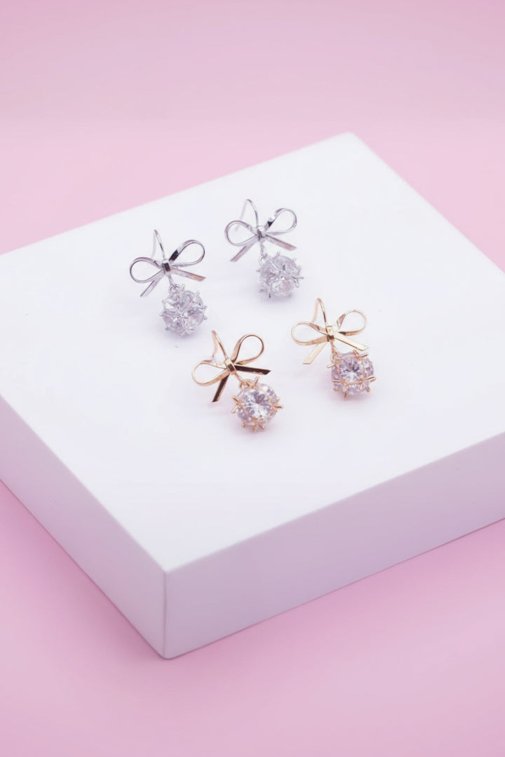 Set of earrings with bow detail and crystal drop