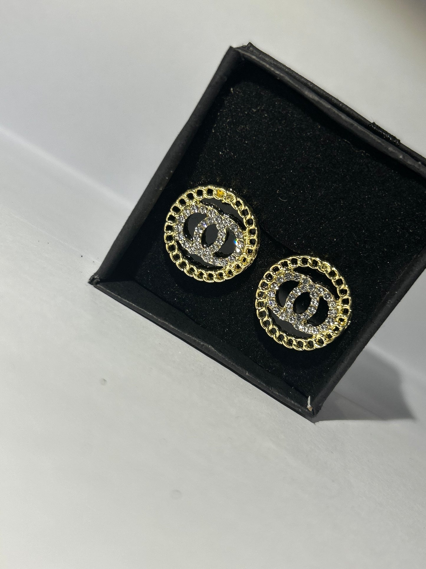 Black and gold circle earrings