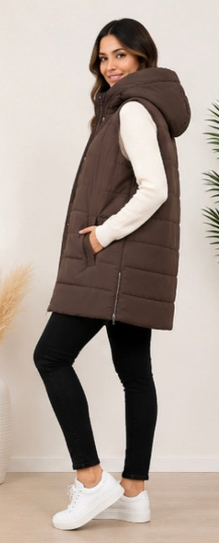 Long brown padded gilet with hood, quilted design and front zip fastening, sleeveless puffer bodywarmer with pockets