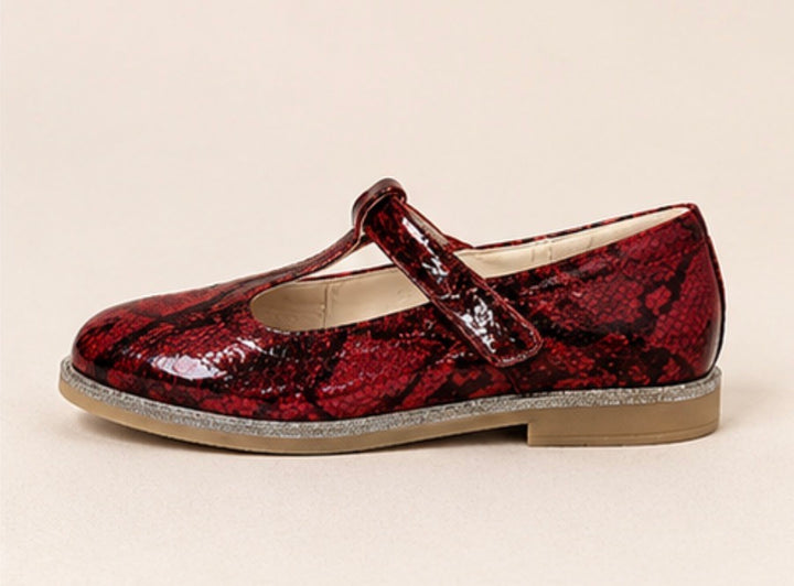 Red snakeskin-effect occasional shoes with glitter sole detail and fastening strap.