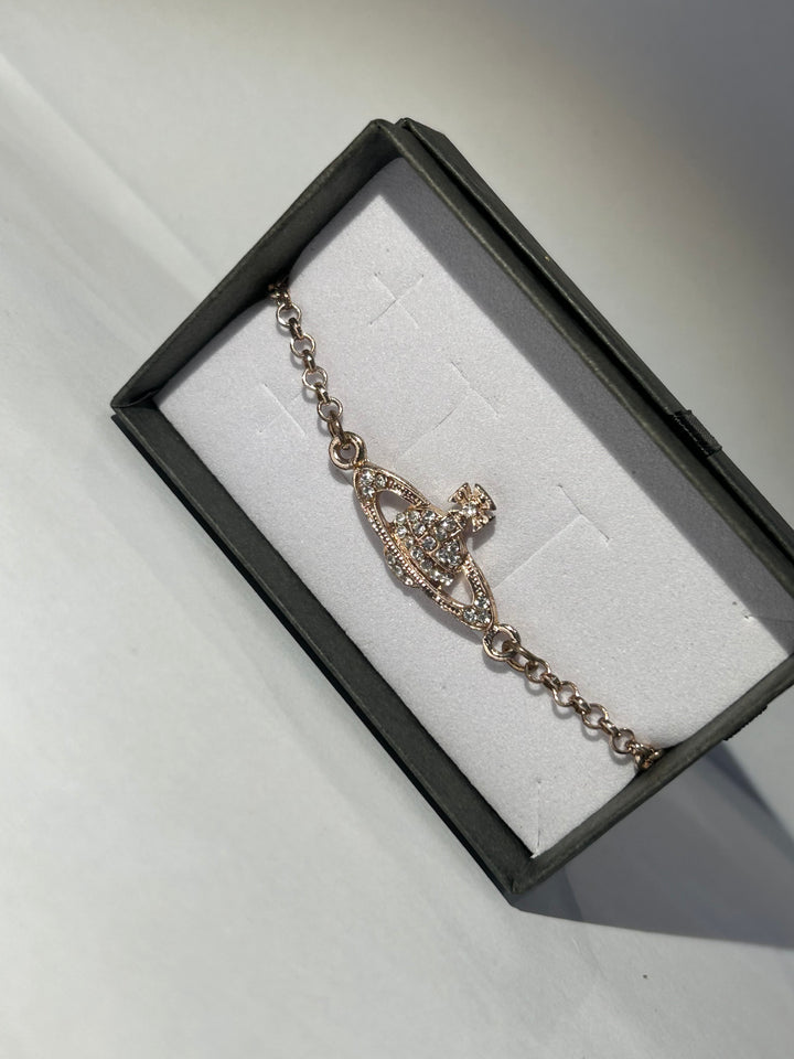 Rose gold planet bracelet