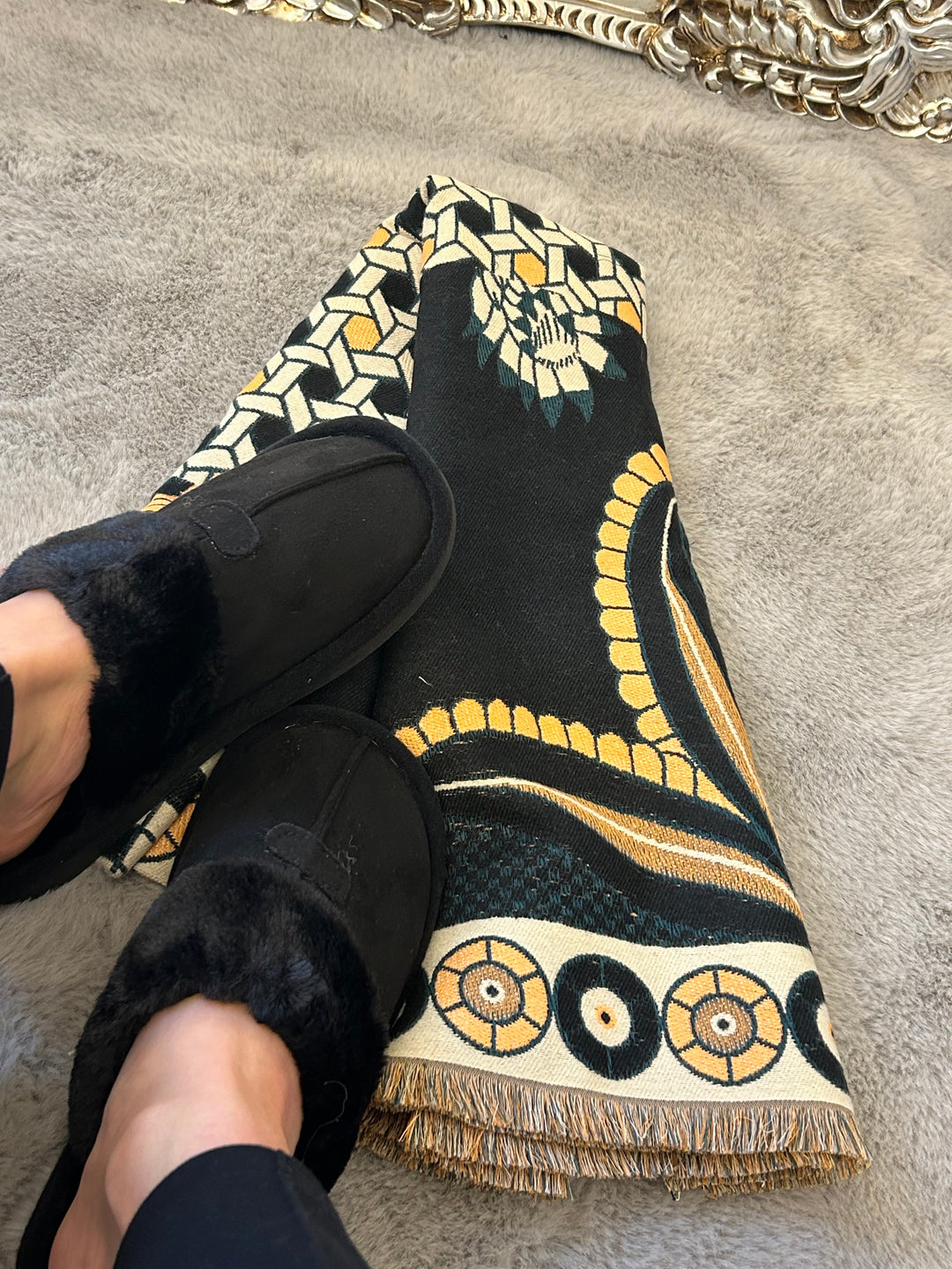Black slip on slippers with black flower patterned scarf 