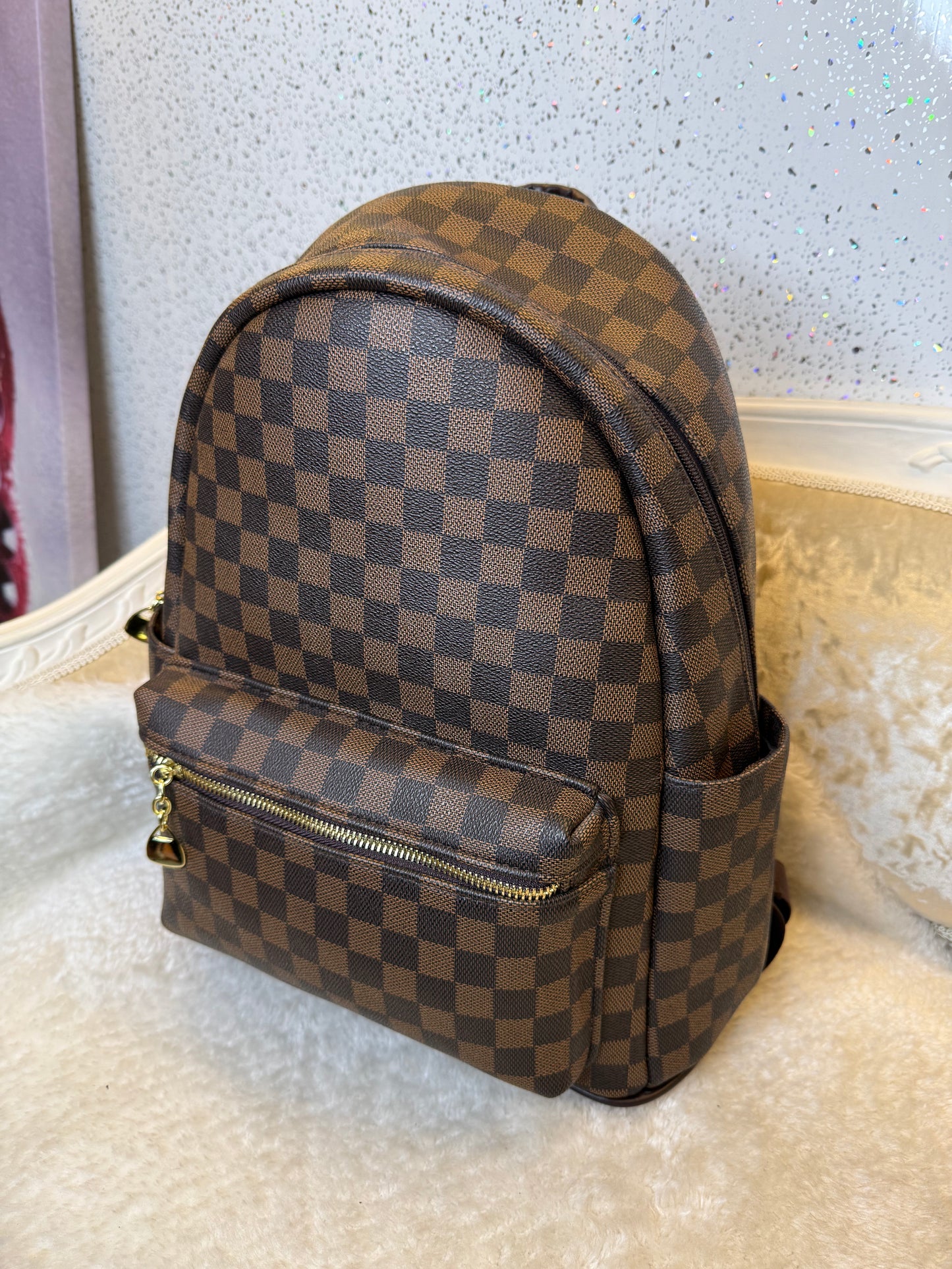Brown checked rucksack backpack with gold detailing 