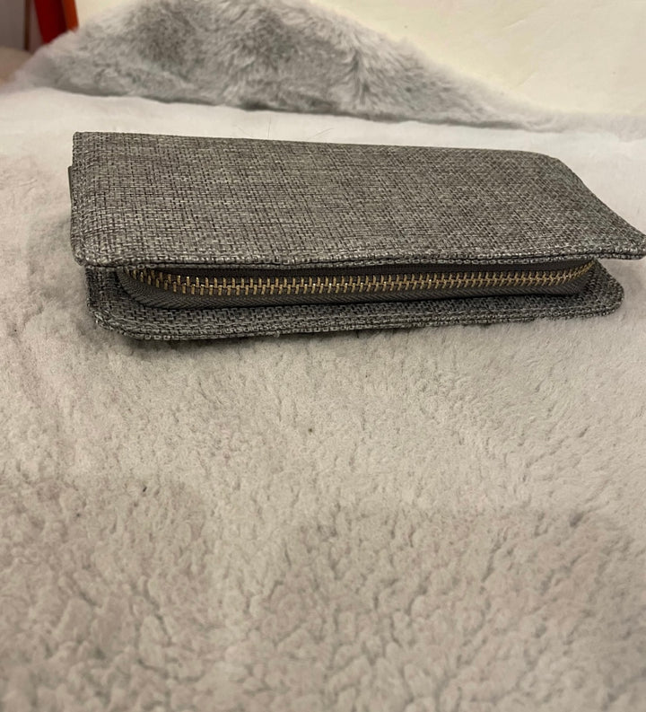 Grey tweed purses with zip gold detailing 