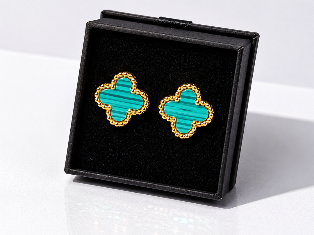 Green clover stud earrings with gold trim 