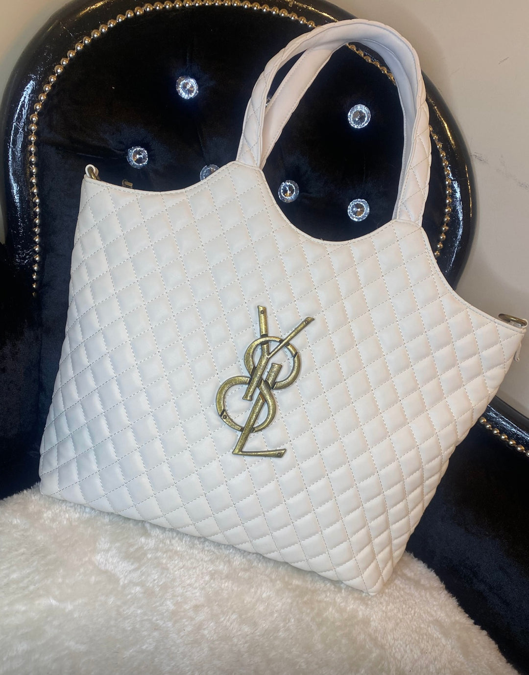 White large size quilted bag with gold detailed hardware and long adjustable removable strap