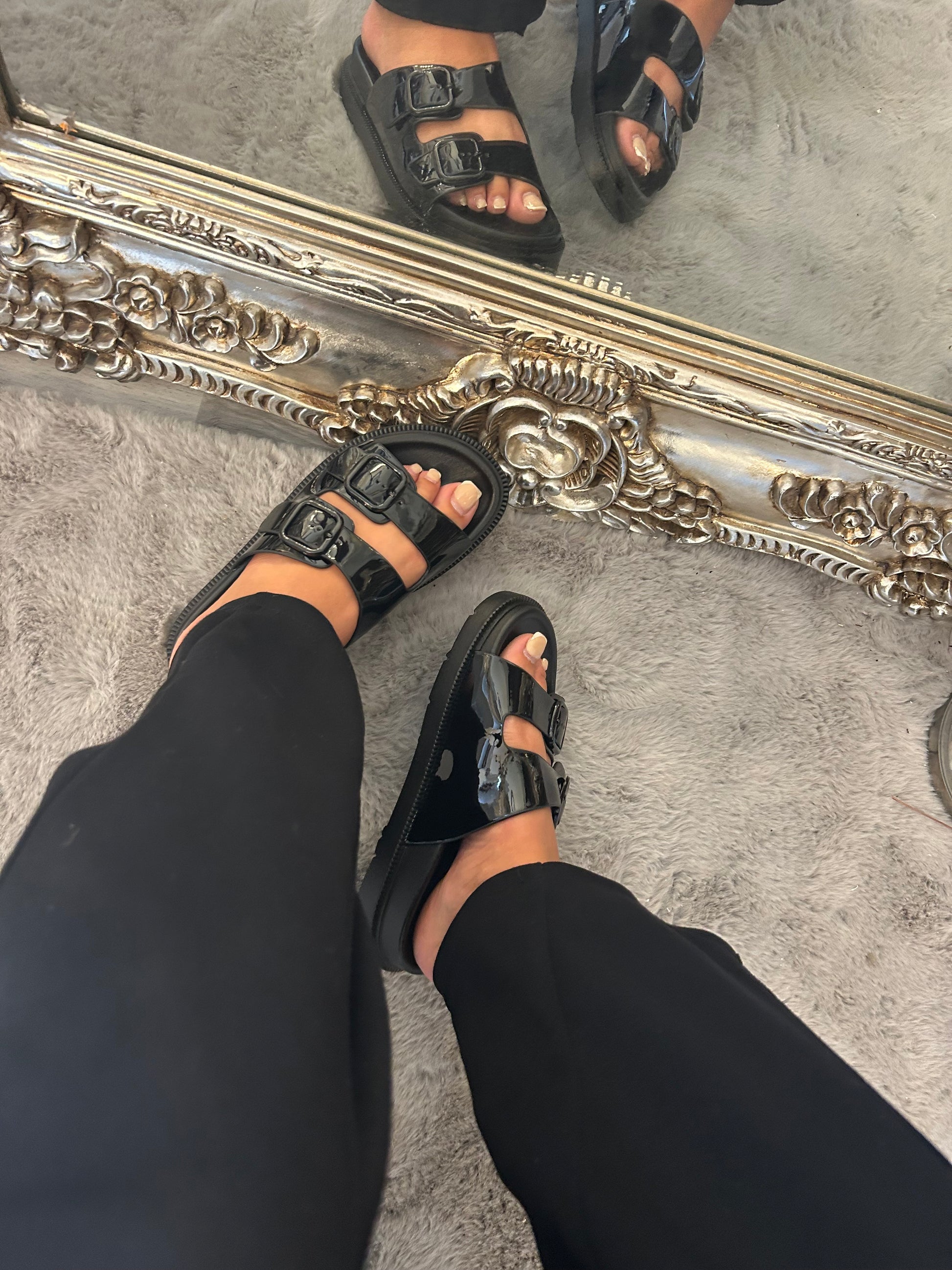Black patent sandal with buckle design