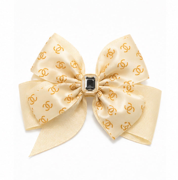 Luxury ribbon hair bow clip with crystal centre and layered ribbon design